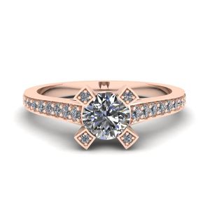 Anello di design con diamante tondo e pavé in oro rosa