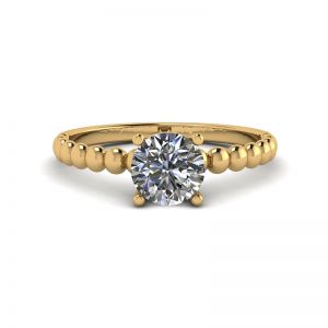 Solitario con diamante tondo su anello con perline in oro giallo