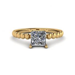 Anello barbuto con diamante a taglio princess in oro giallo 18 carati
