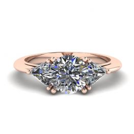 Anello con tre diamanti in oro rosa 18 carati
