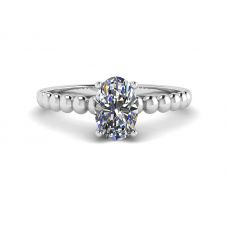 Diamante ovale su anello in oro bianco 18 carati con perline